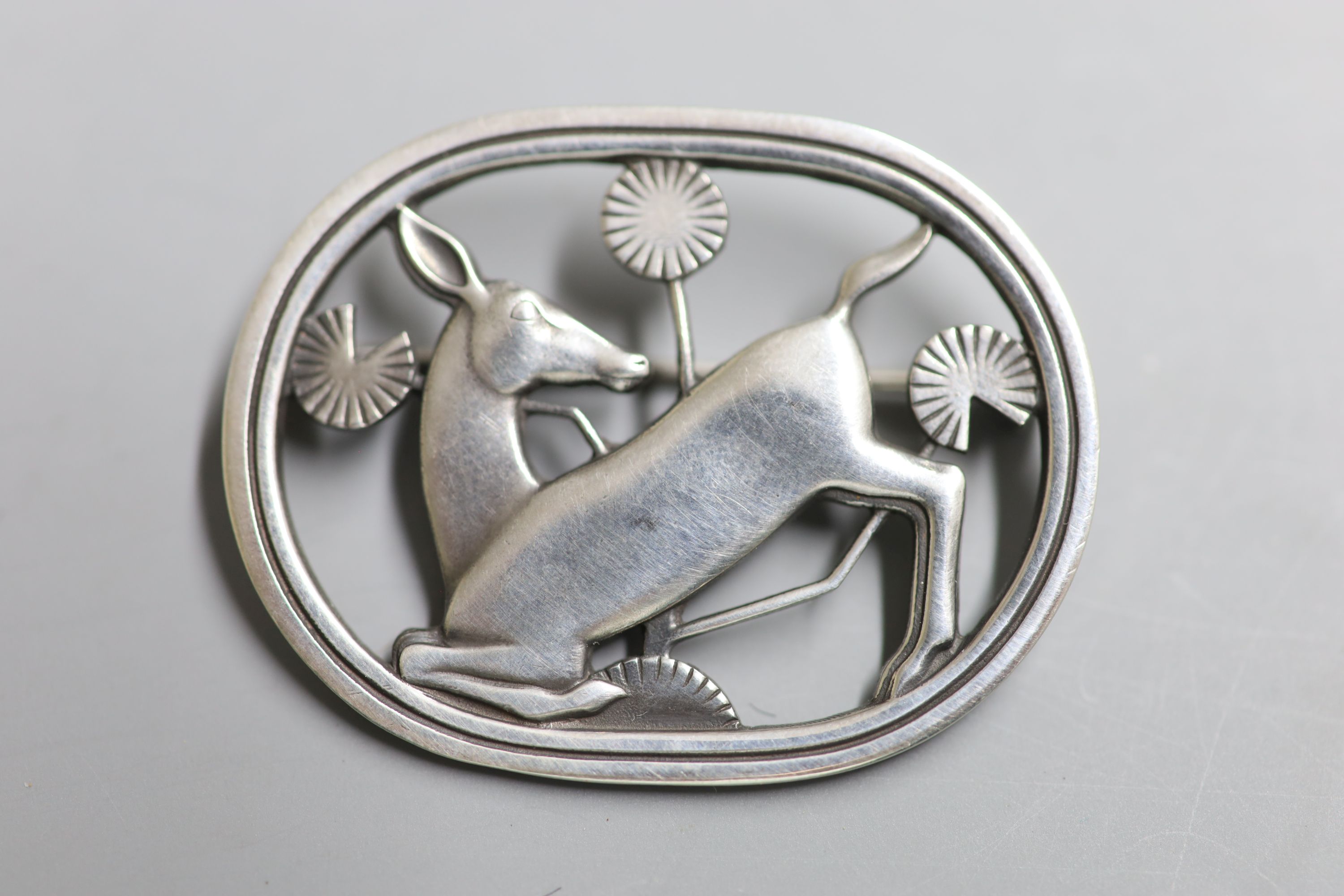 A Georg Jensen 925 kneeling deer oval brooch, design no. 256, 43mm, gross 12.2 grams.